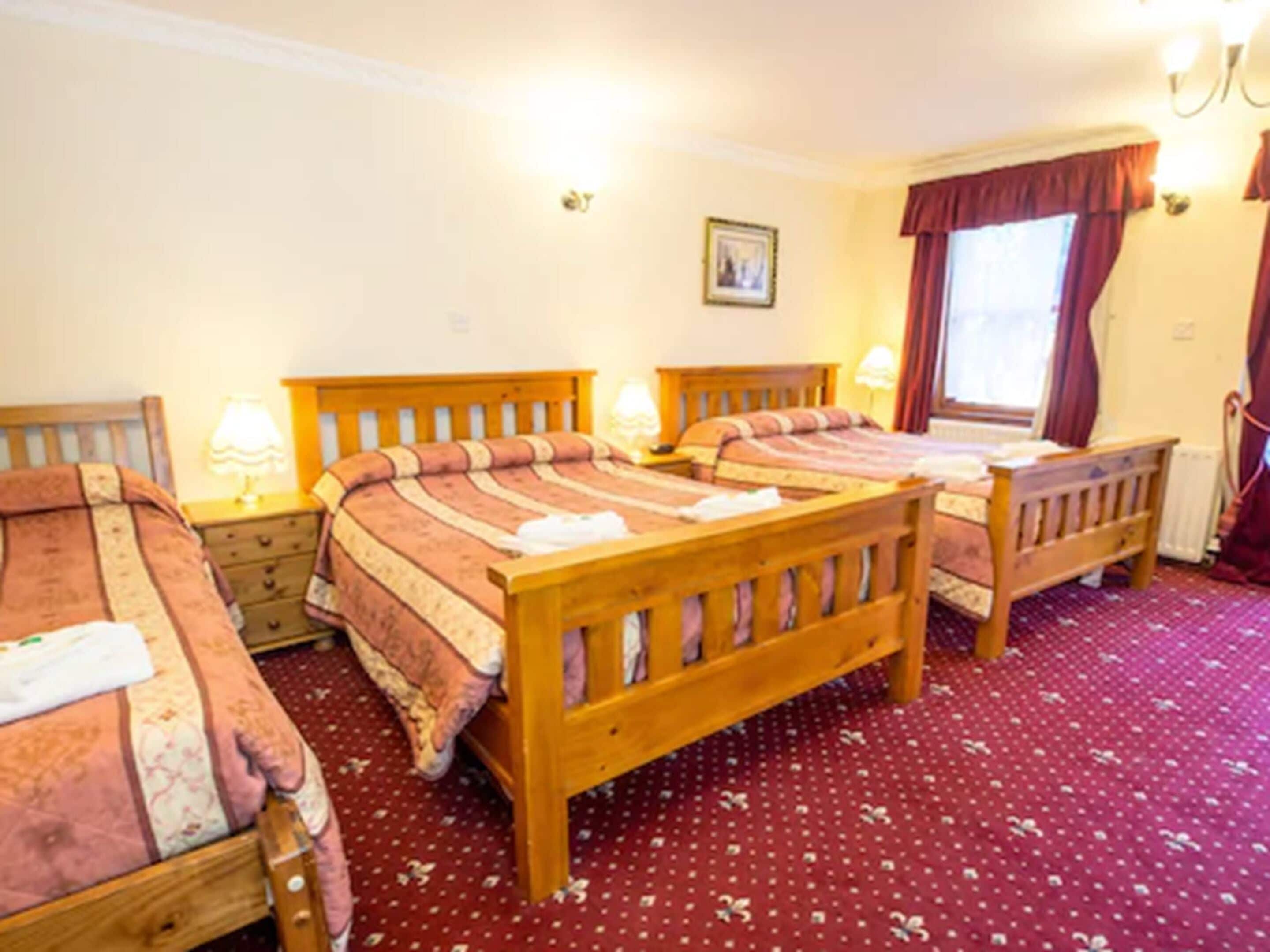 family room | desk, iron/ironing board, travel cot, free wifi