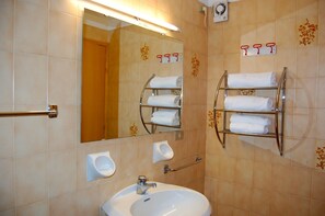 Regadera, regadera tipo lluvia, secadora de cabello, bidet 
