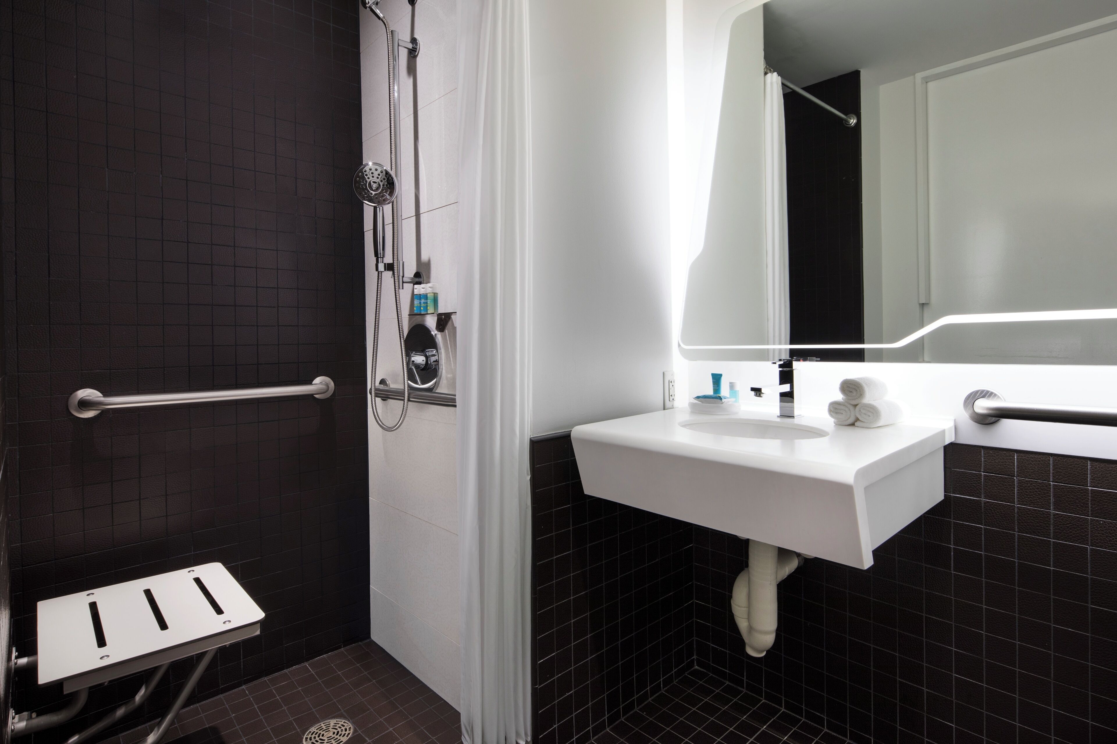 shower, rainfall showerhead, designer toiletries, hair dryer