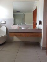 Family Cottage, 2 Bedrooms | Bathroom | Shower, rainfall showerhead, hair dryer, towels