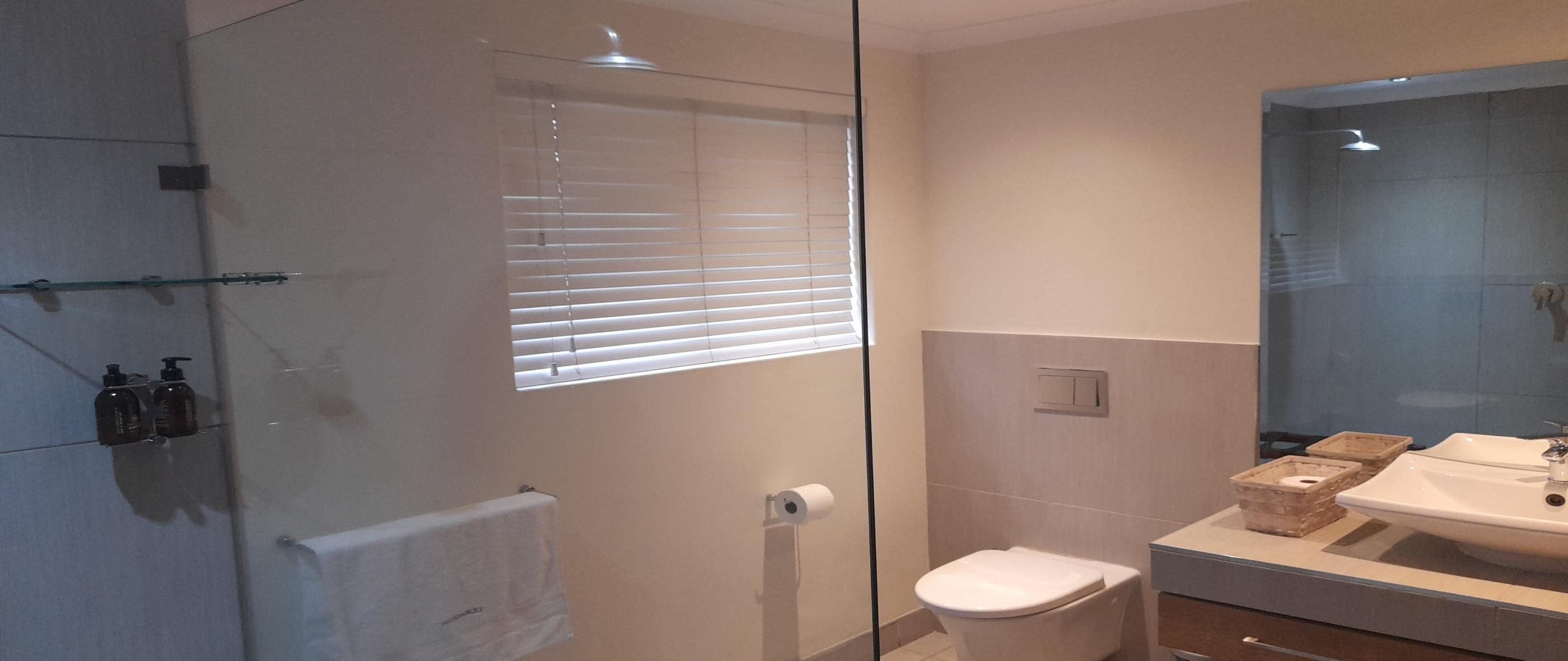 Family Cottage, 2 Bedrooms | Bathroom | Shower, rainfall showerhead, hair dryer, towels