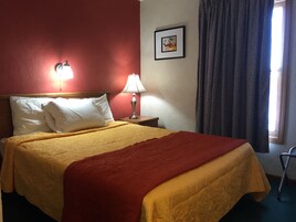 Standard Room, 1 Queen Bed, Kitchenette | Desk, blackout drapes, iron/ironing board, free rollaway beds