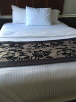 Ropa de cama de alta calidad y tabla de planchar con plancha 