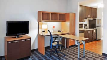 Pillowtop beds, desk, blackout drapes, iron/ironing board