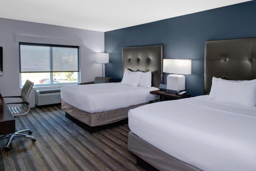 Premium bedding, pillowtop beds, desk, blackout drapes