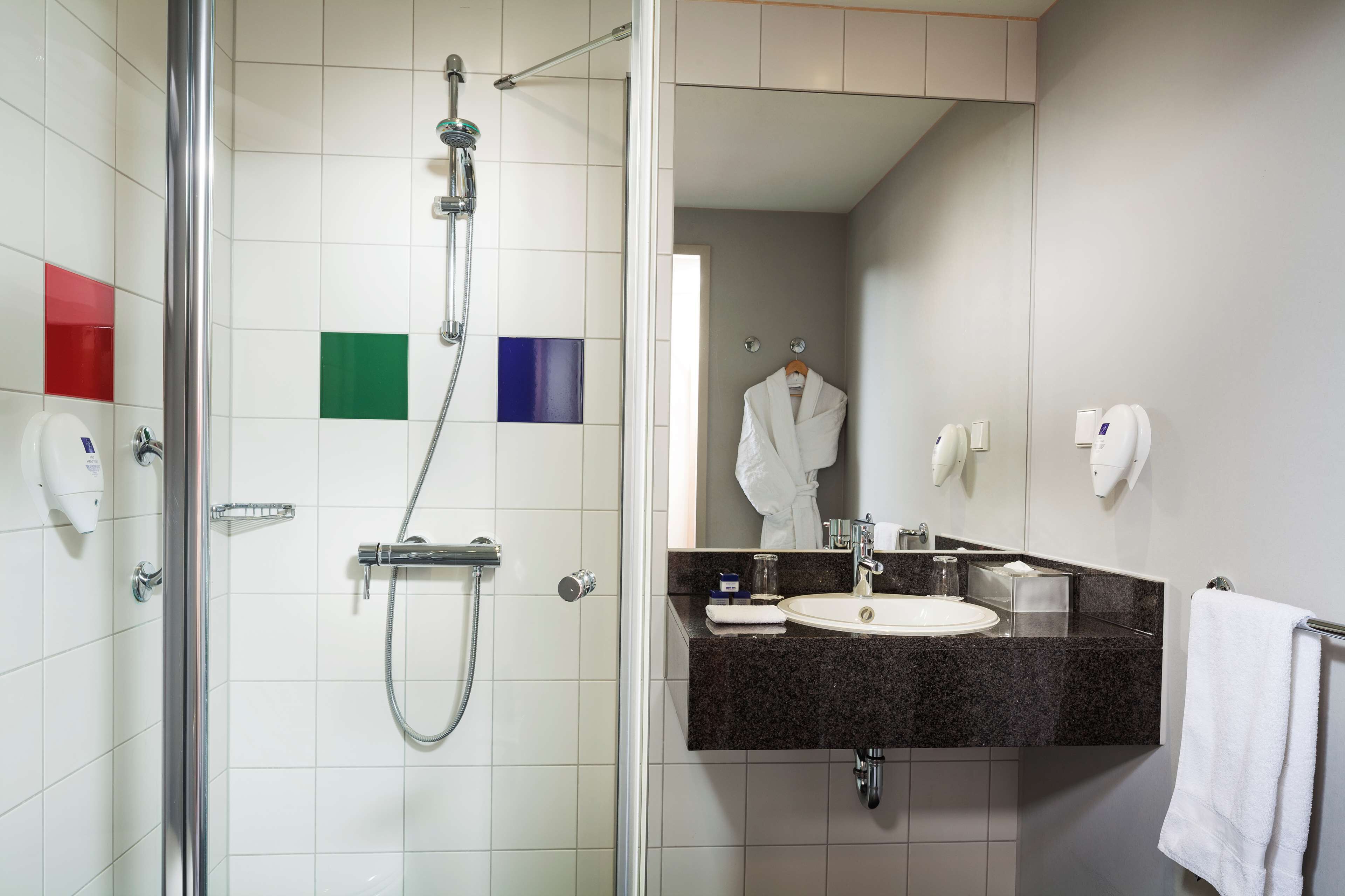 shower, eco-friendly toiletries, hair dryer, towels