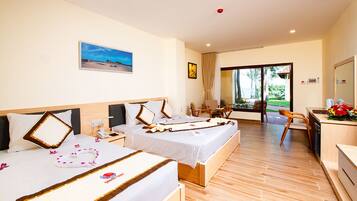 Triple Room | Minibar, in-room safe, blackout drapes, free WiFi