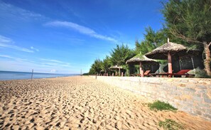 Private beach, white sand, sun-loungers, beach umbrellas - Golden Coast Resort and Spa (Phan Thiet)
