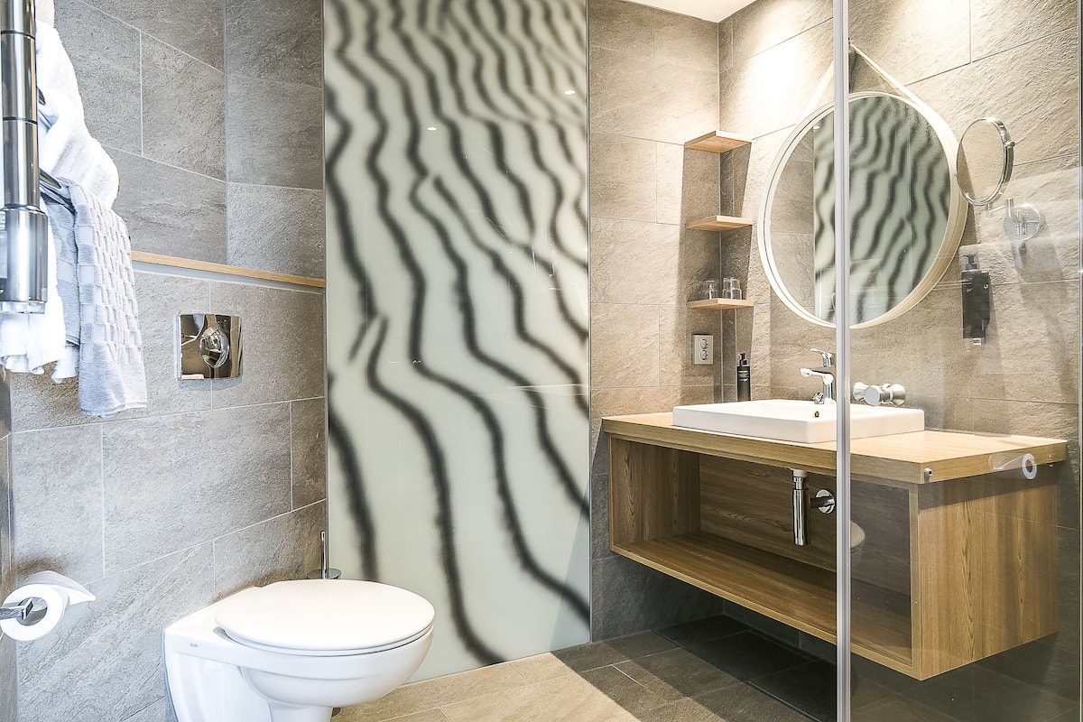 hair dryer, bathrobes, towels