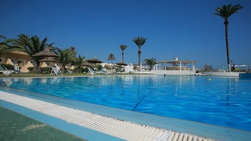 Seasonal outdoor pool, open 9 AM to 6 PM, pool umbrellas, pool loungers