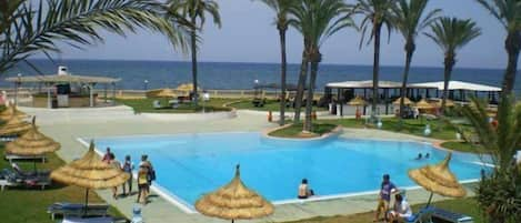 Seasonal outdoor pool, open 9 AM to 6 PM, pool umbrellas, sun loungers