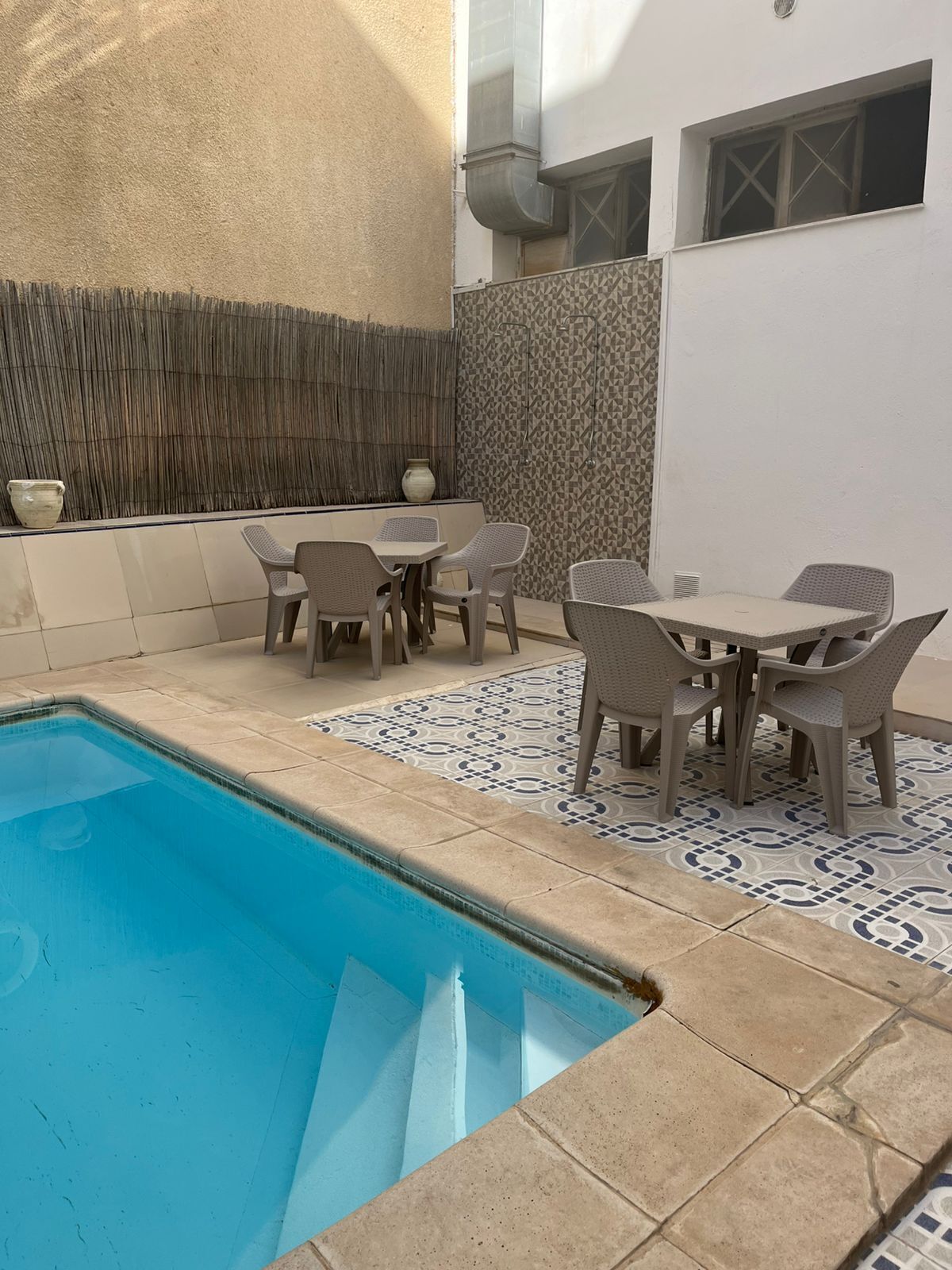 Seasonal outdoor pool, pool umbrellas, pool loungers
