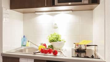 Fridge, microwave, stovetop, cookware/dishes/utensils