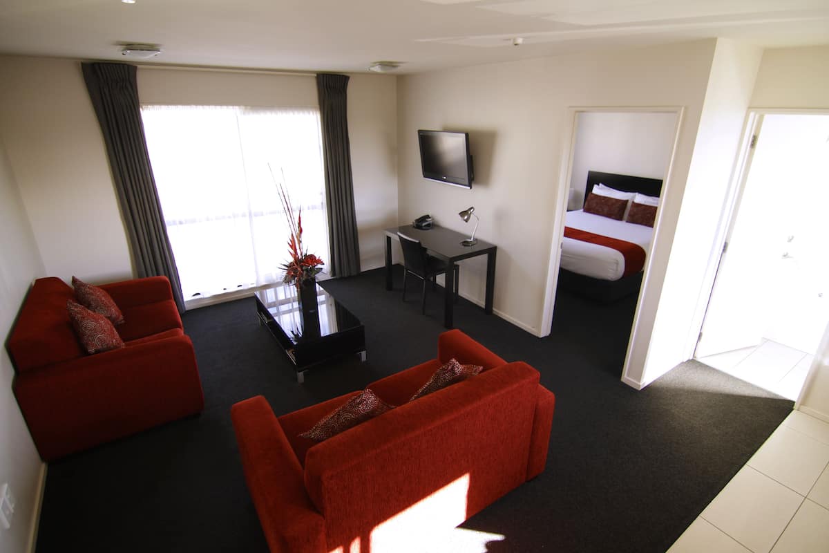 Executive Apartment, 1 Bedroom | Living area | 32-inch LCD TV with satellite channels, TV, DVD player
