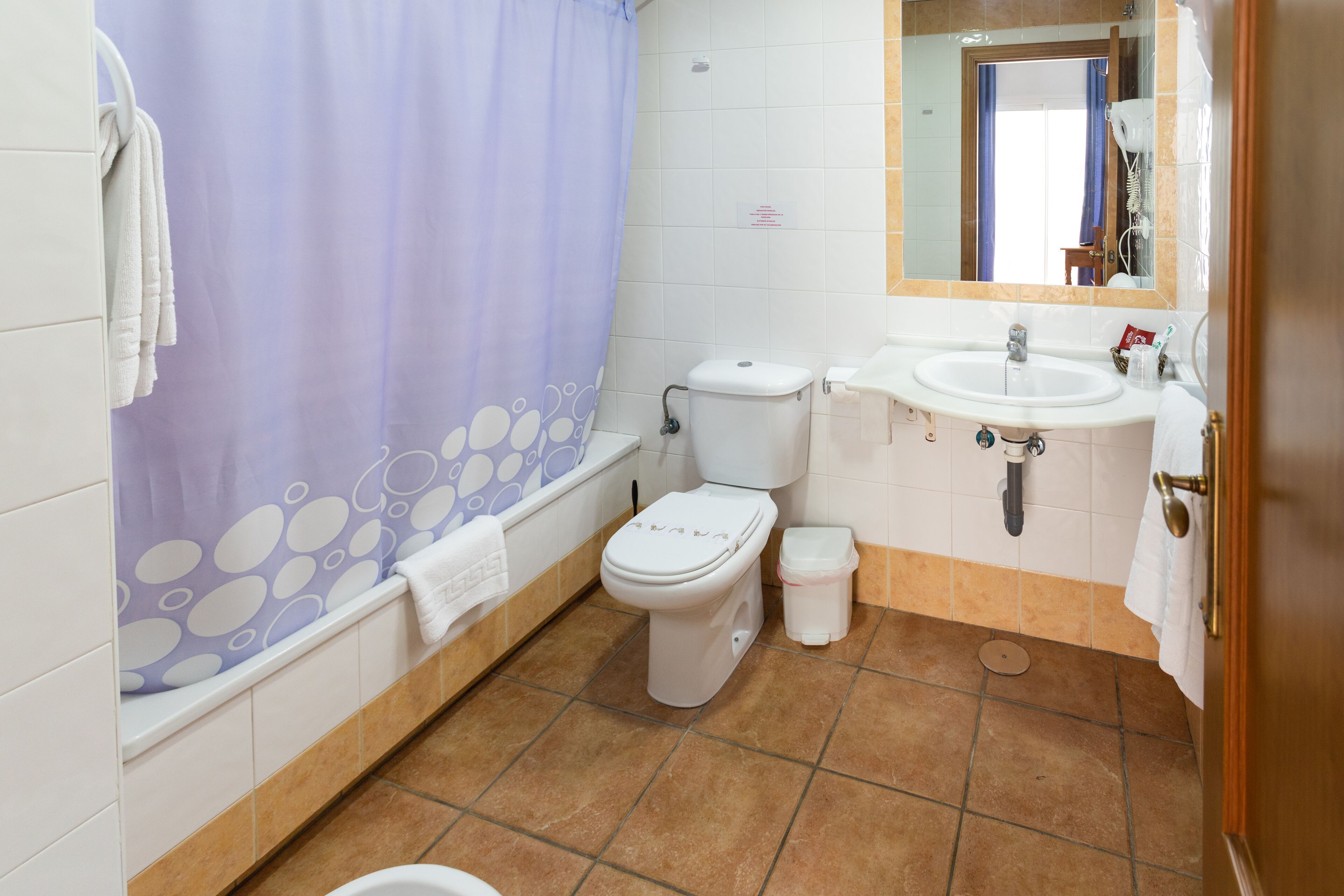 double room, patio | bathroom | combined shower/bathtub, hair dryer, bidet, towels