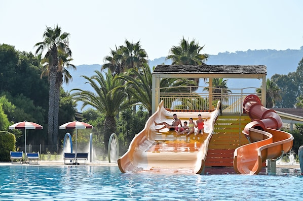 2 outdoor pools, pool umbrellas, pool loungers