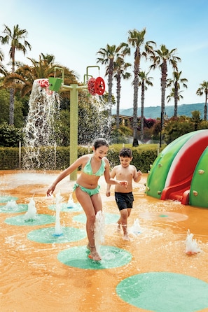 2 outdoor pools, pool umbrellas, pool loungers