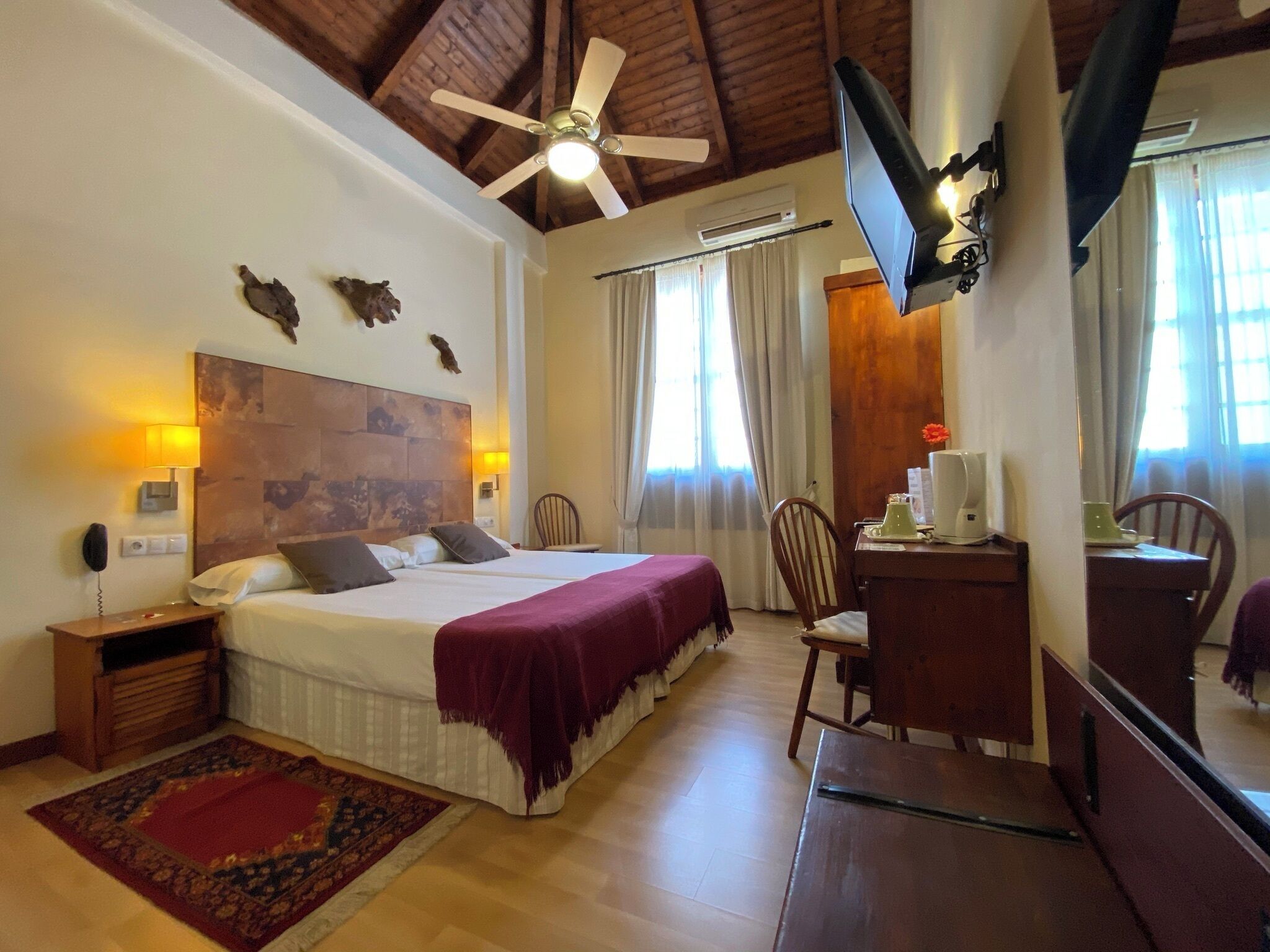 Premium bedding, down comforters, in-room safe, desk