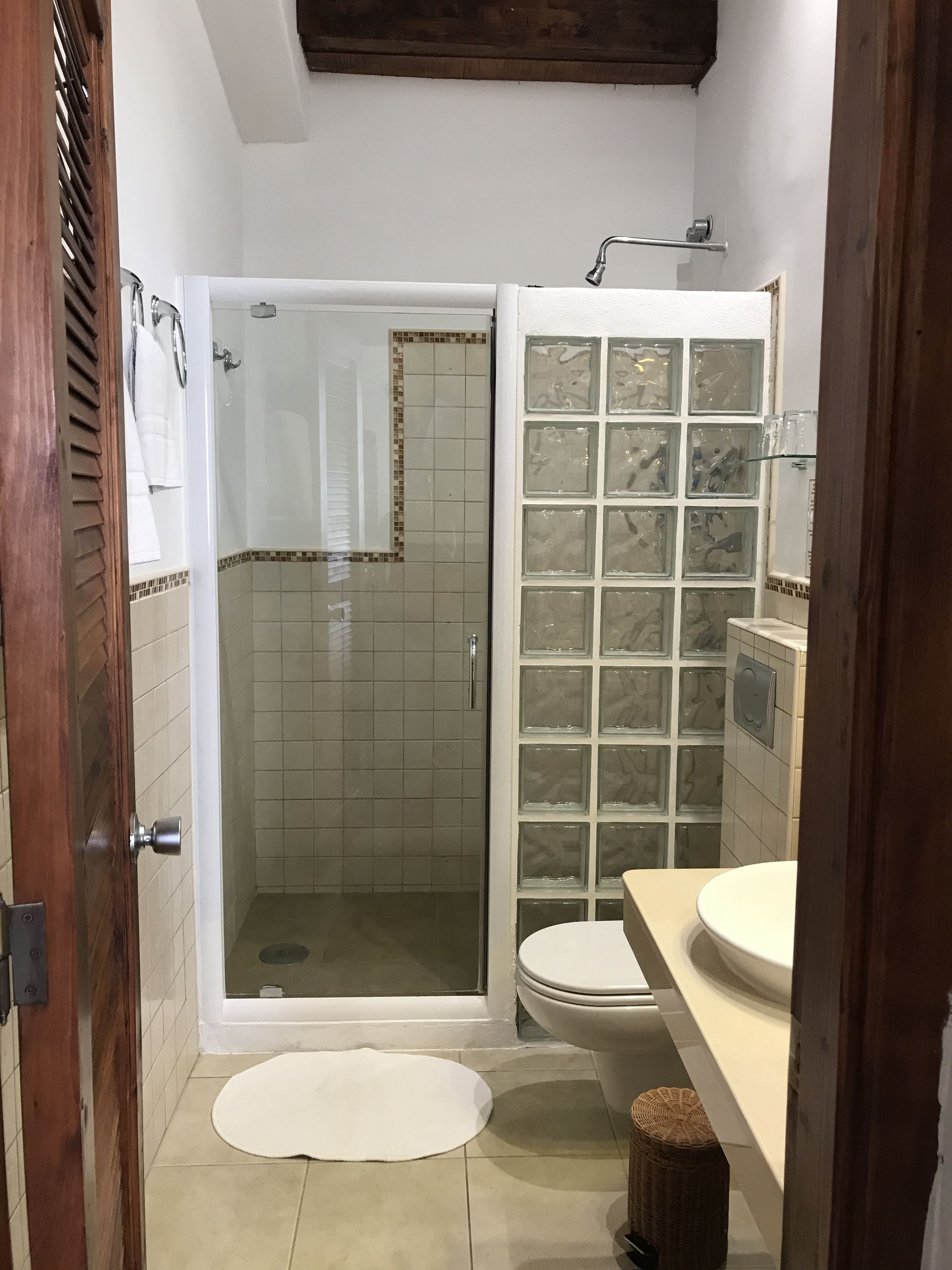 superior double room | bathroom | shower, rainfall showerhead, free toiletries, hair dryer