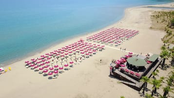 Private beach, sun loungers, beach umbrellas, beach volleyball