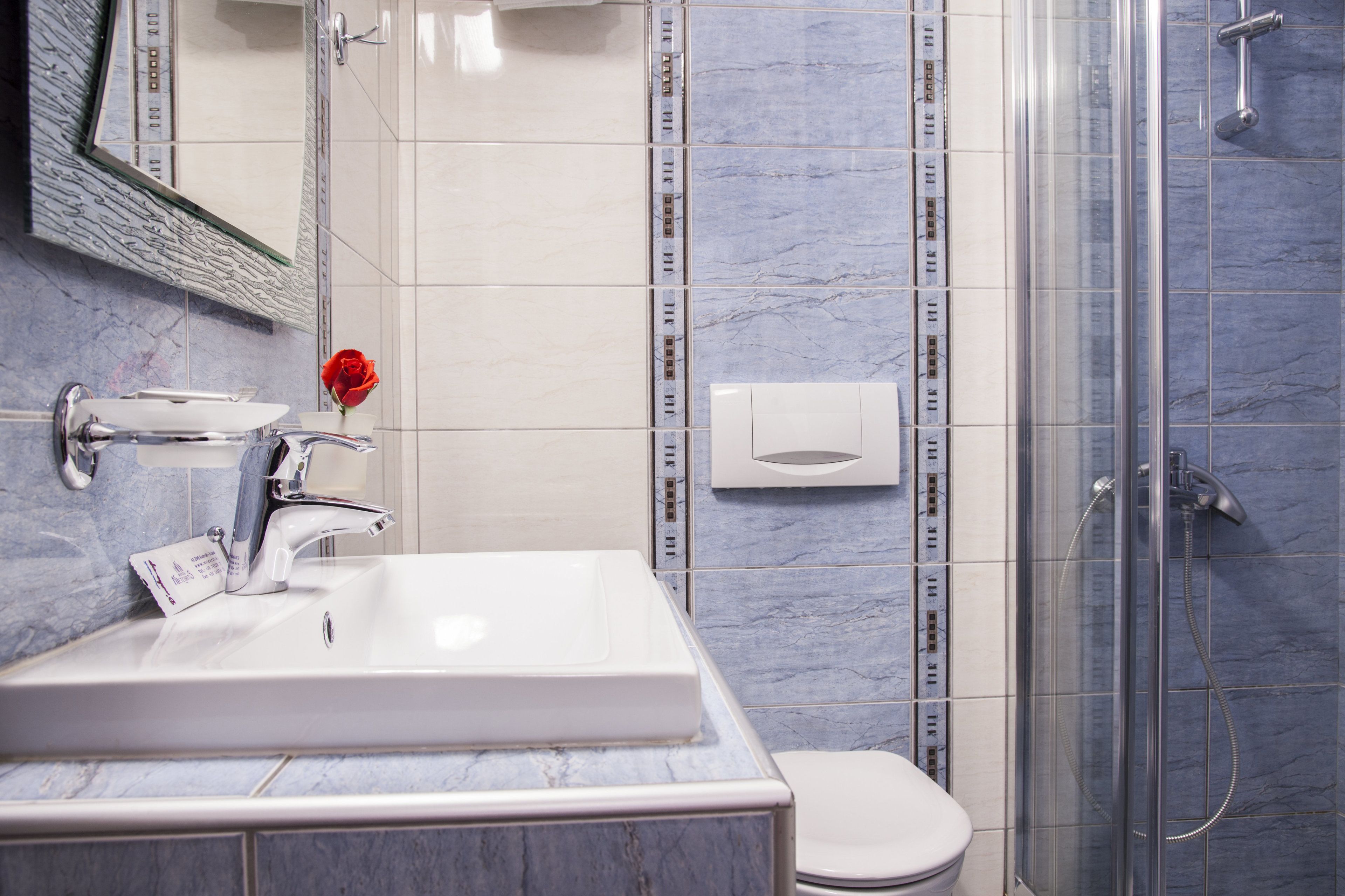 superior triple room (garden and meteora view) | bathroom | free toiletries, hair dryer, towels