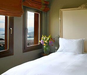 Double Room, Fireplace, Sea View | Egyptian cotton sheets, down comforters, pillowtop beds, minibar