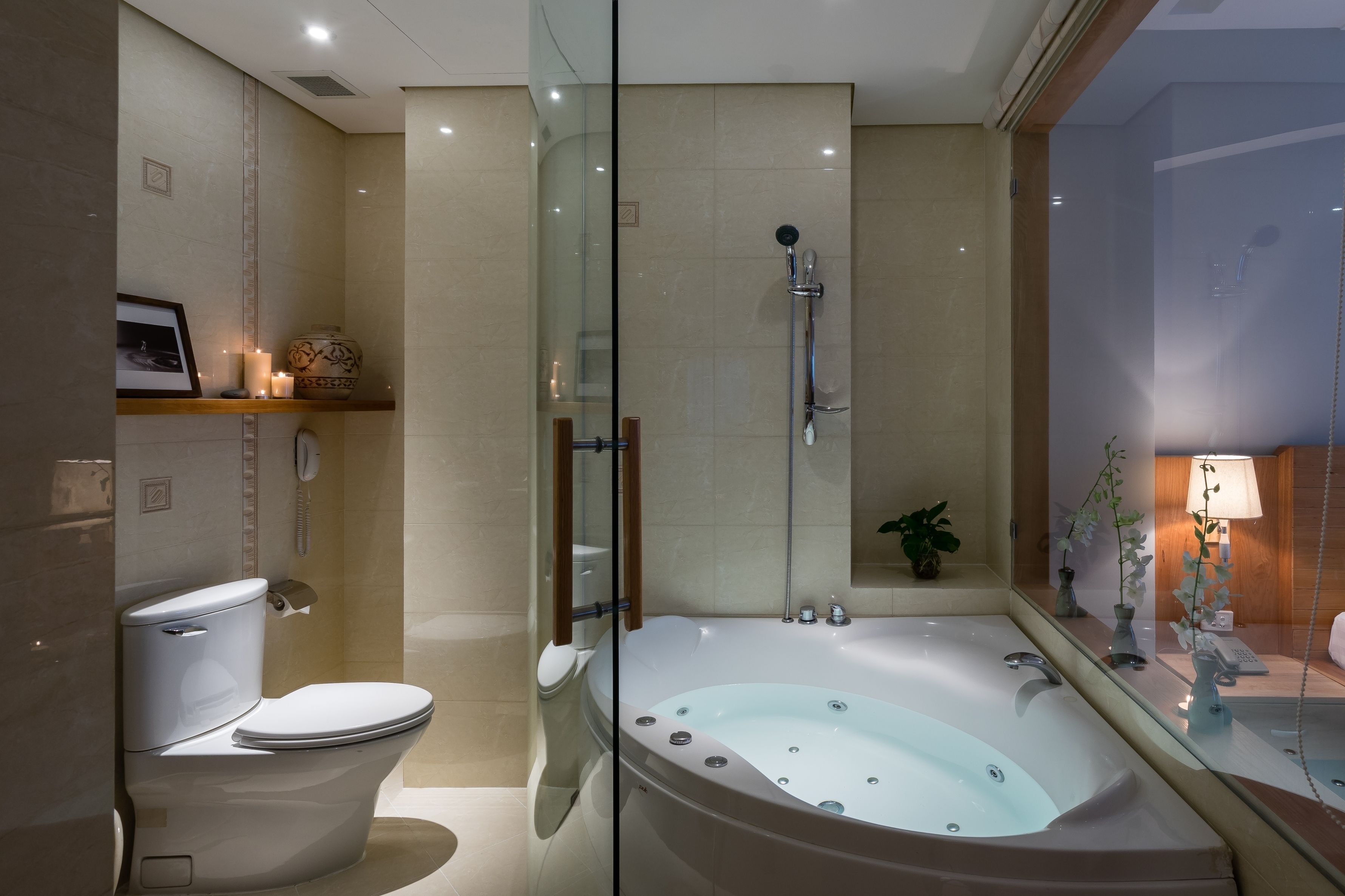 suite king bed with afternoon tea | bathroom | free toiletries, hair dryer, slippers, towels