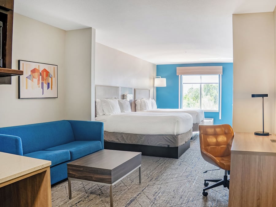 Premium bedding, down comforters, pillowtop beds, in-room safe
