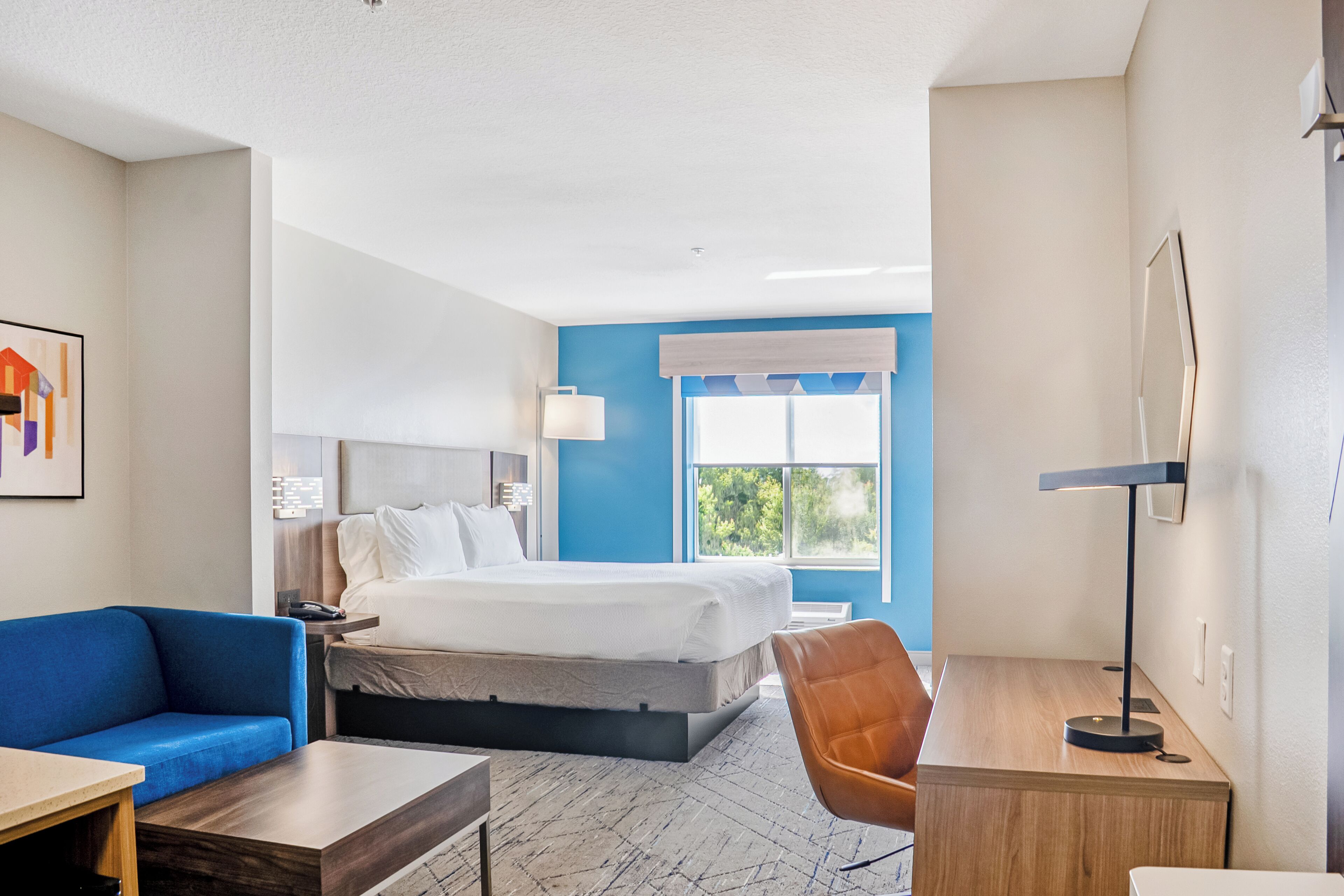 Premium bedding, down comforters, pillowtop beds, in-room safe