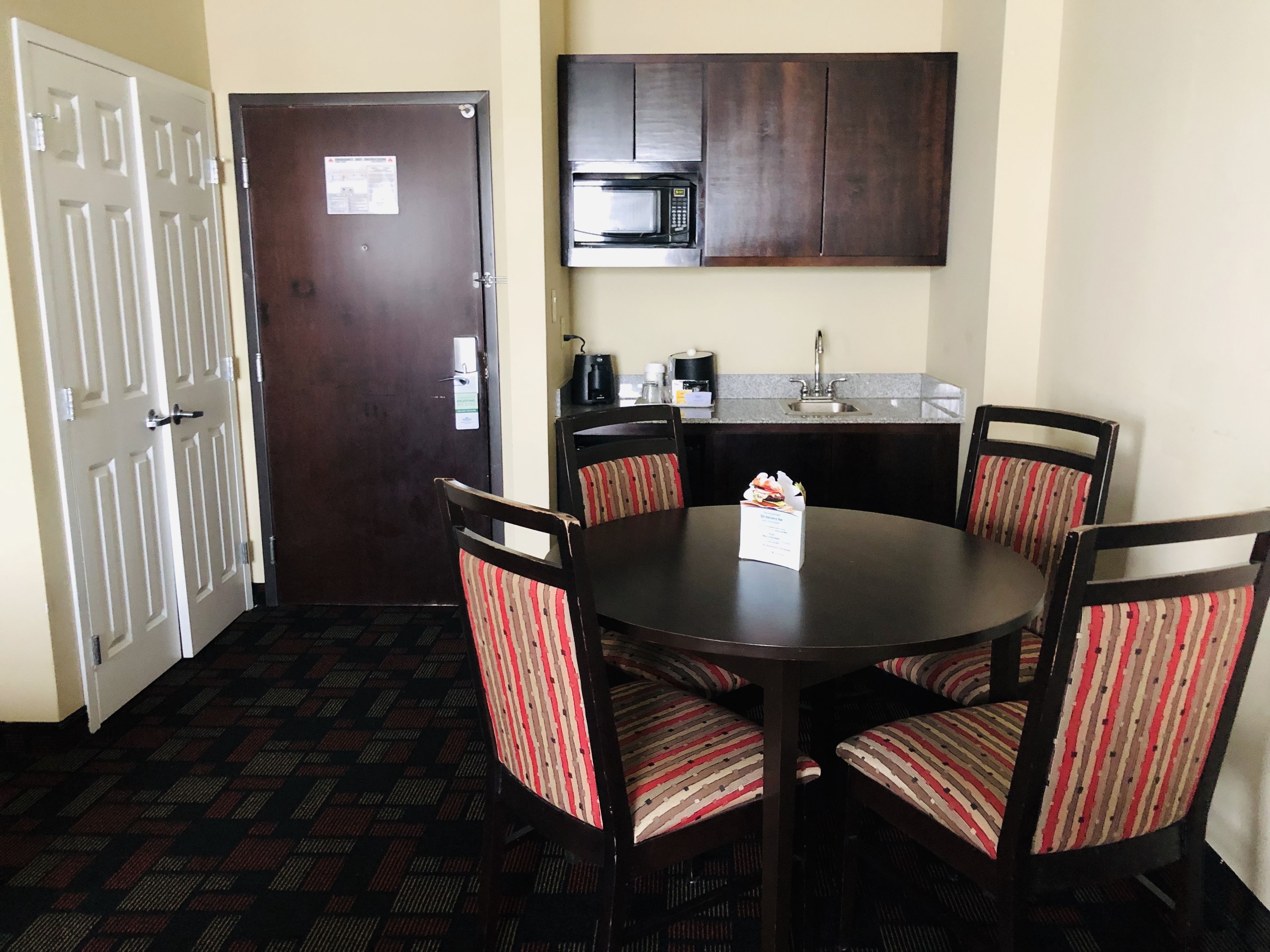 desk, blackout curtains, iron/ironing board, free cots/infant beds