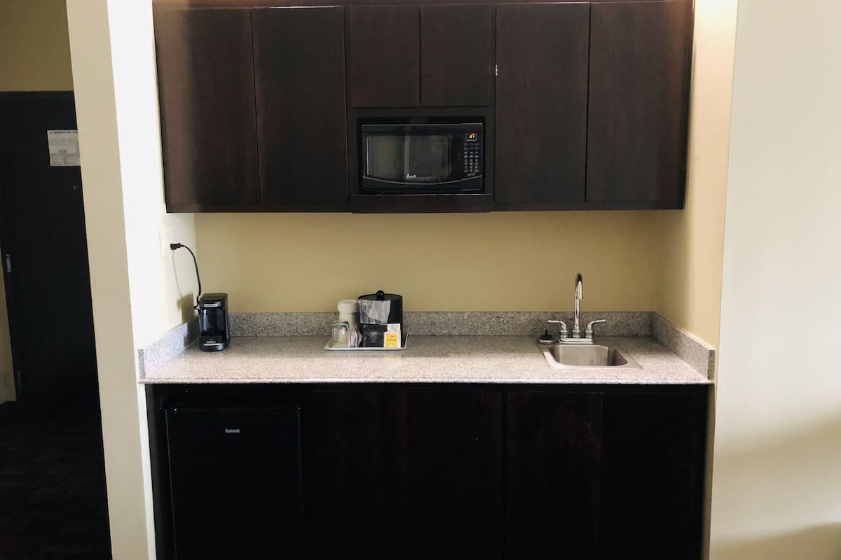 desk, blackout curtains, iron/ironing board, free cots/infant beds