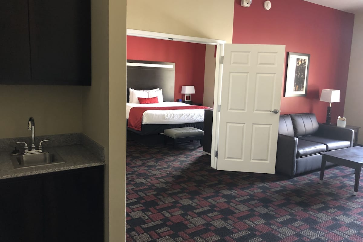 desk, blackout curtains, iron/ironing board, free cots/infant beds