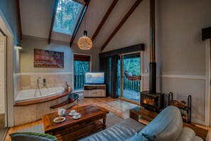 Rainforest Villa | Living area | 106-cm flat-screen TV with digital channels, TV, fireplace