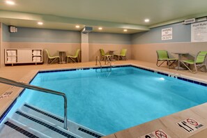 Indoor pool, pool umbrellas, sun loungers