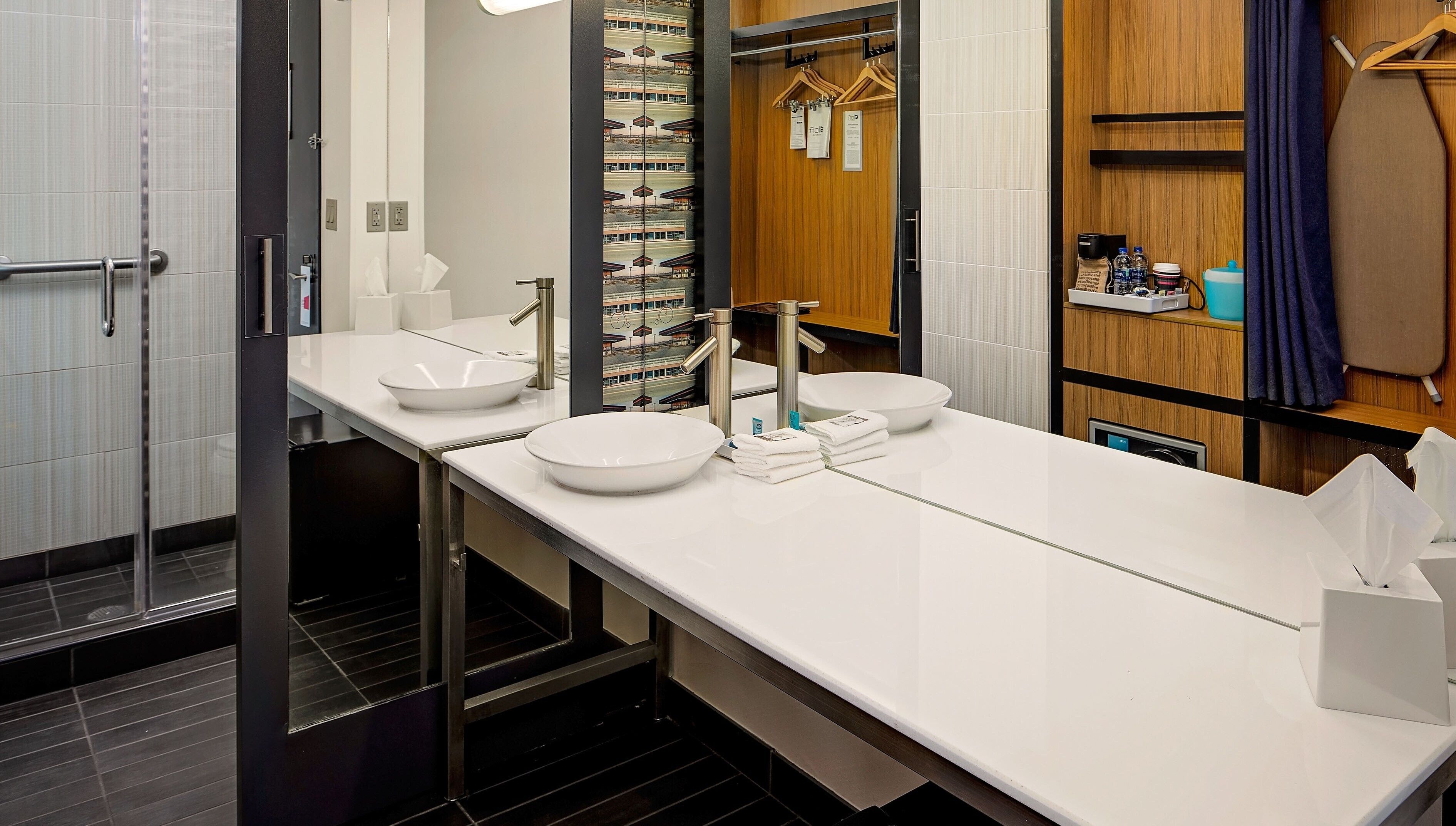 hypo-allergenic bedding, down duvets, pillow-top beds, in-room safe