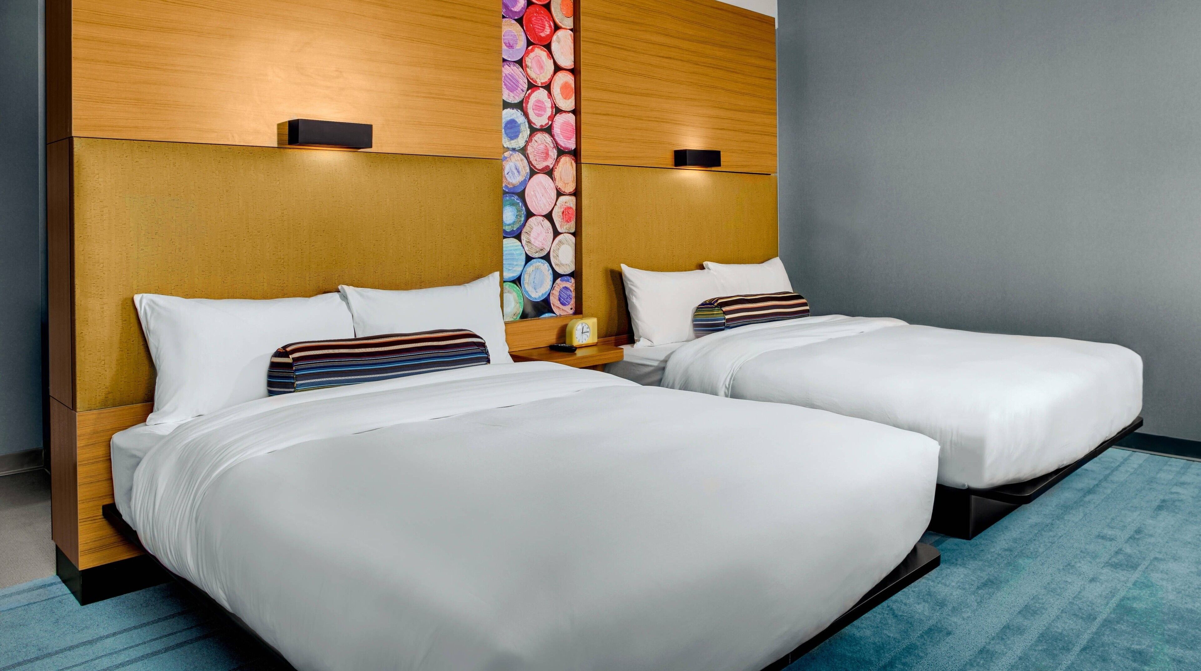 hypo-allergenic bedding, down duvets, pillow-top beds, in-room safe