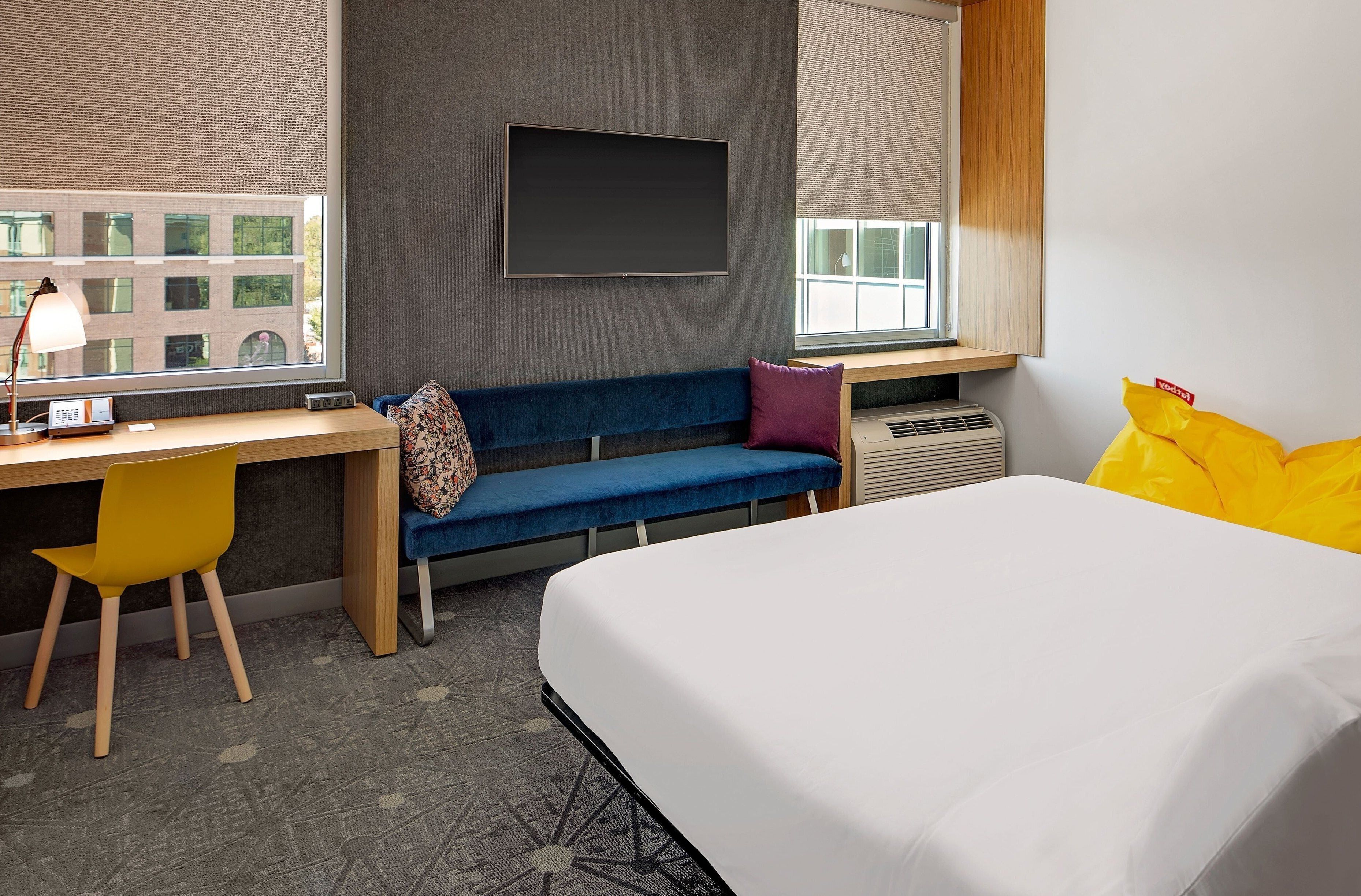 hypo-allergenic bedding, down duvets, pillow-top beds, in-room safe