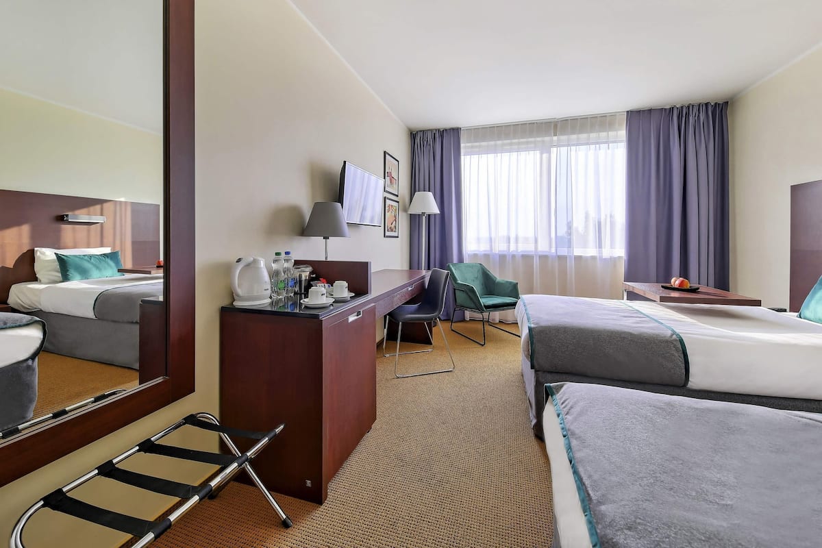 Habitación clásica, 2 camas individuales | Ropa de cama de alta calidad y caja de seguridad en la habitación