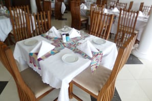 Breakfast, lunch served; international cuisine, al fresco dining