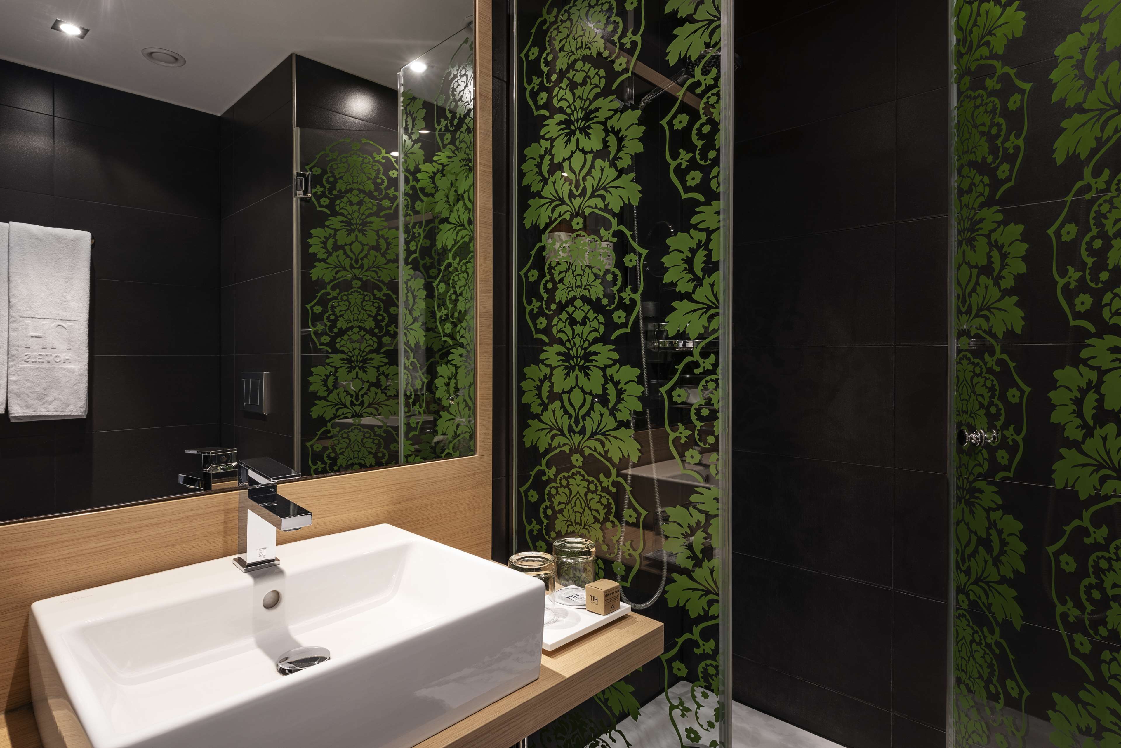 shower, eco-friendly toiletries, hair dryer, towels