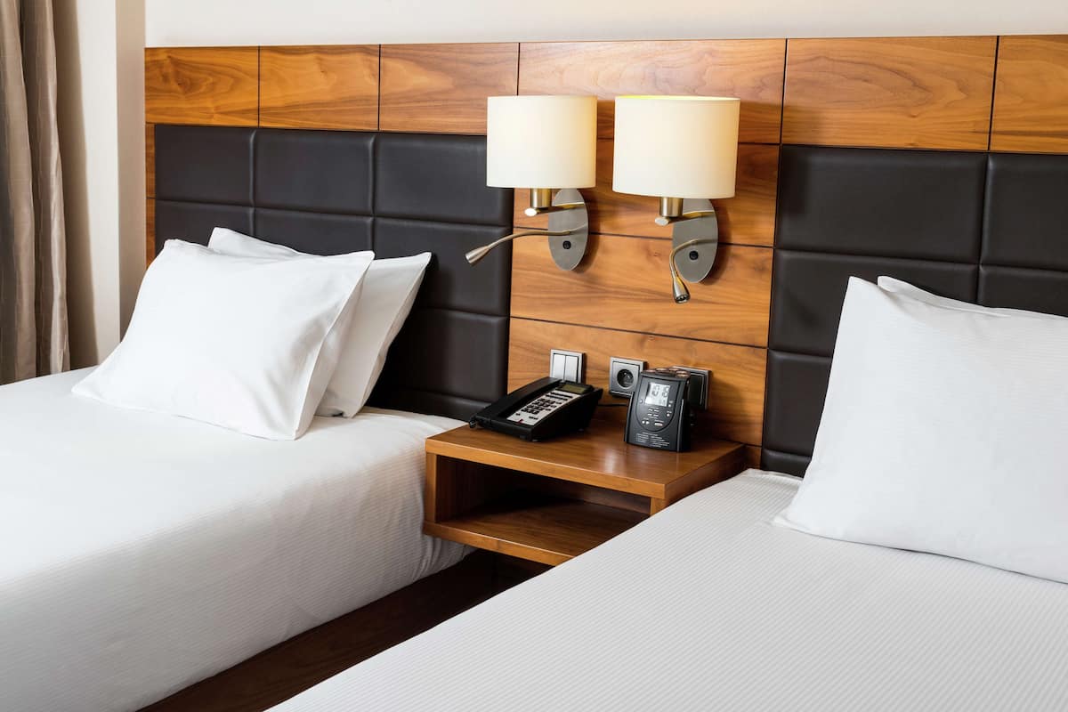 room, 2 single beds | premium bedding, in-room safe, desk, blackout curtains