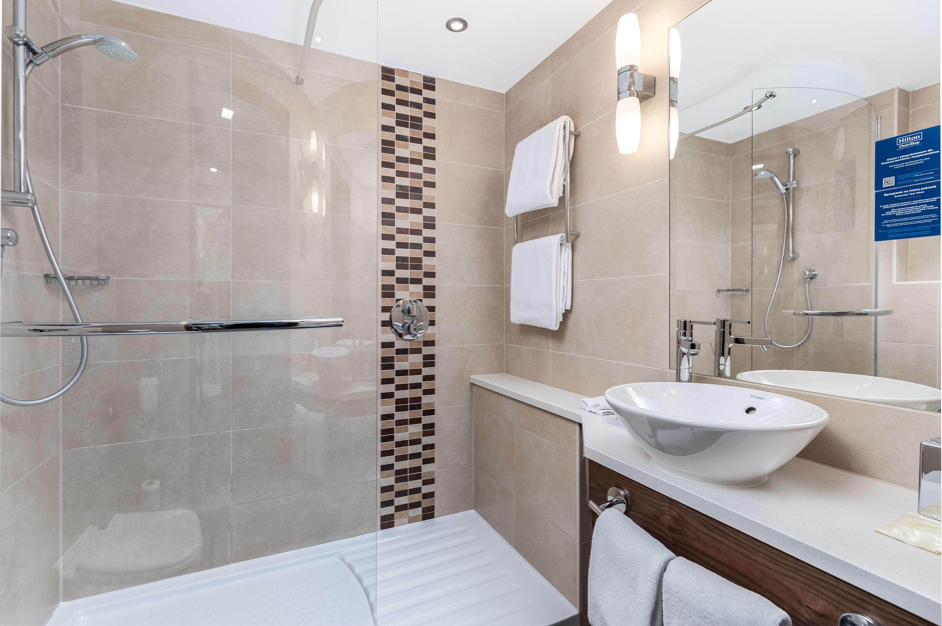 junior suite, 1 king bed | bathroom | free toiletries, hair dryer, towels