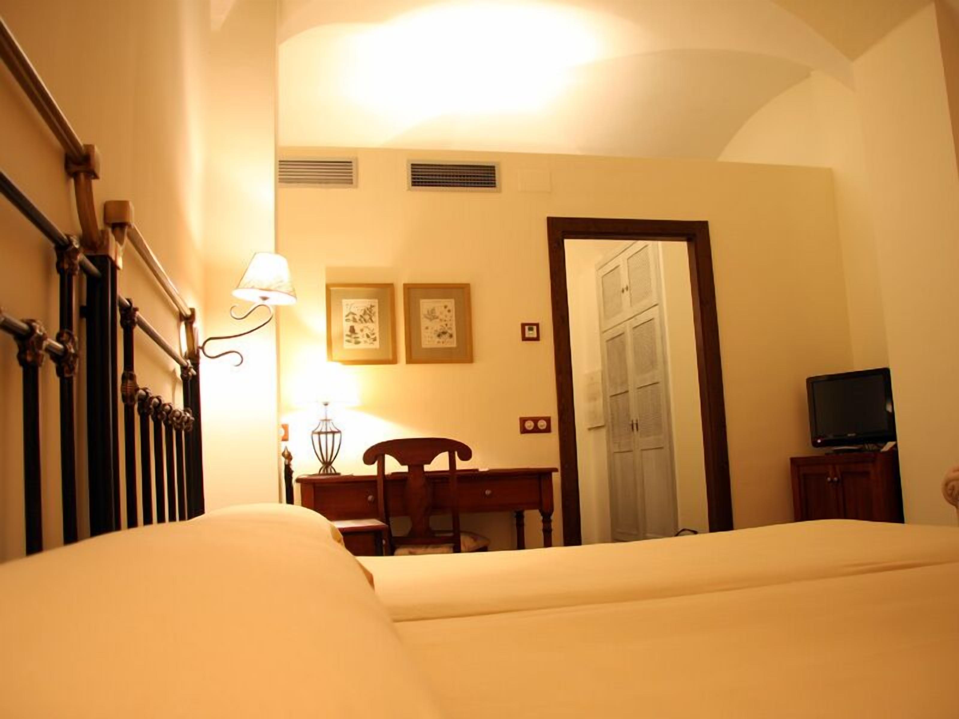 twin room | minibar, in-room safe, desk, blackout curtains