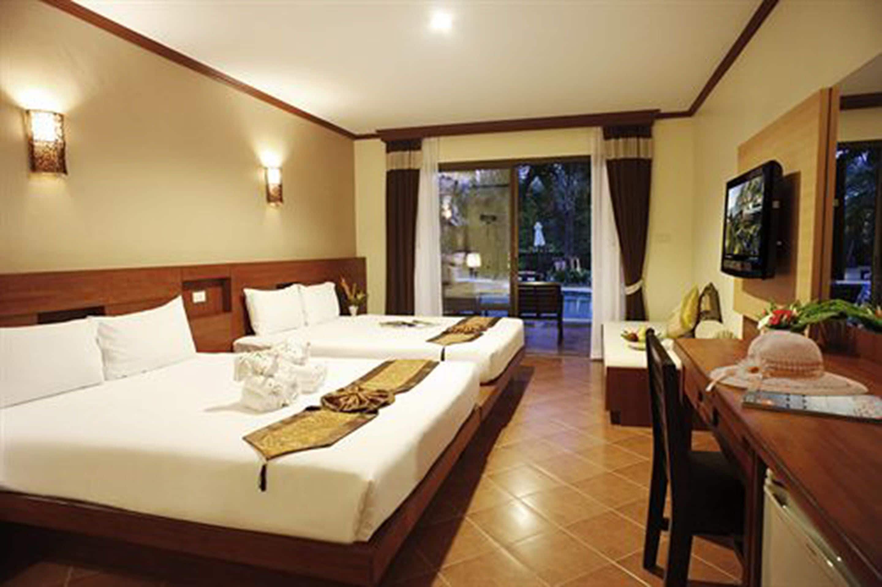 superior room, courtyard area | down duvets, in-room safe, desk, blackout curtains