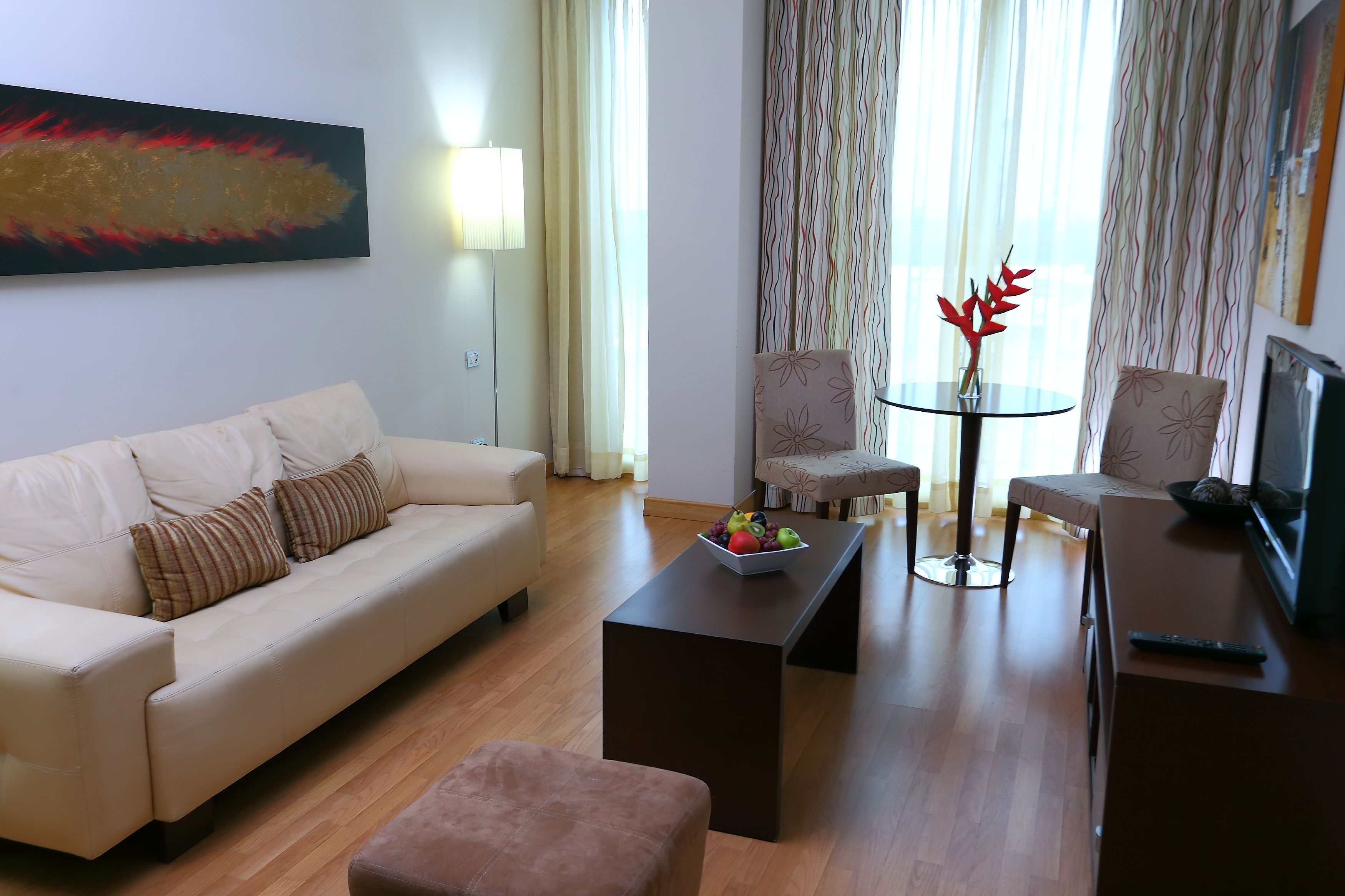 master suite, 1 king bed | living area | lcd tv