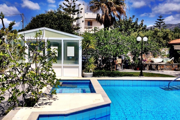 Indoor pool, outdoor pool, pool umbrellas