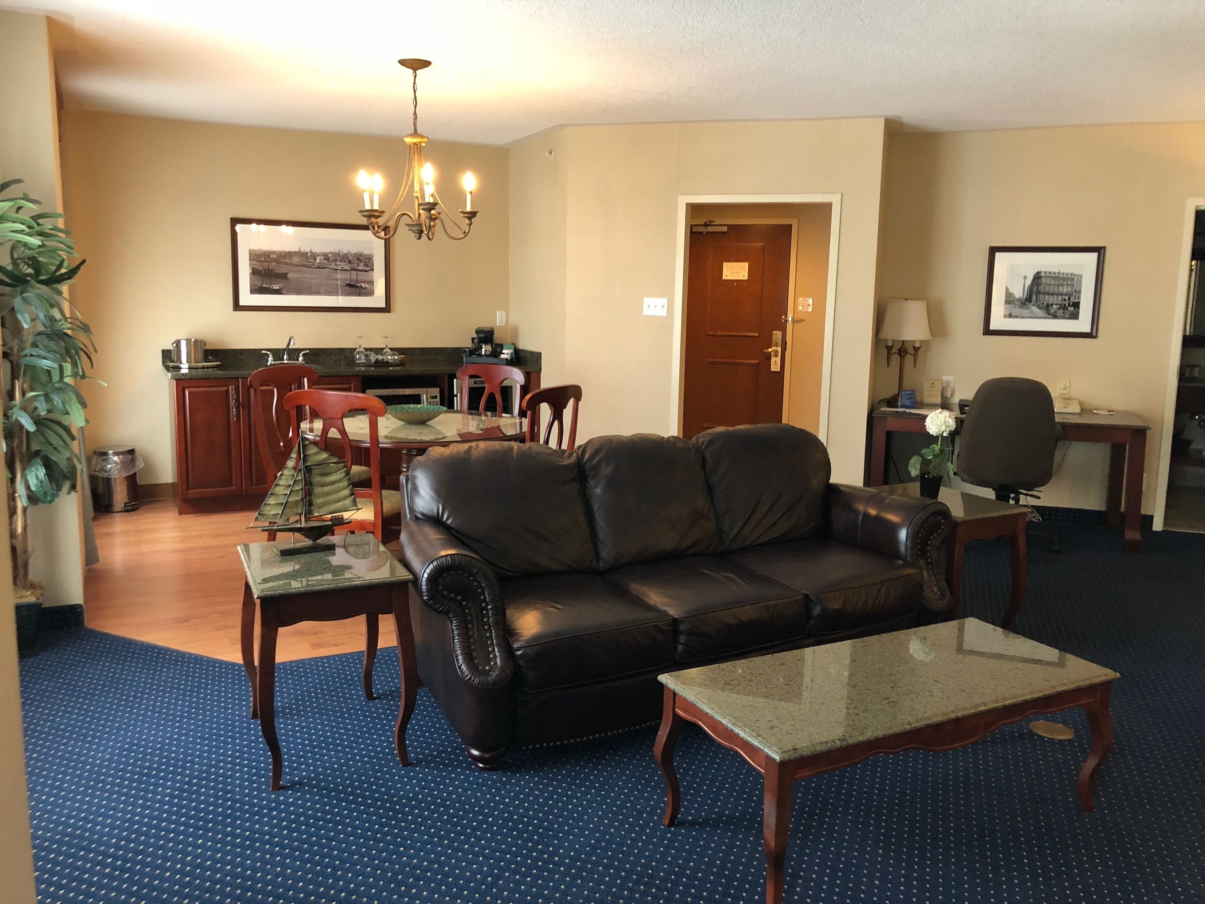 suite, 1 king bed, non smoking | in-room safe, desk, iron/ironing board, free cots/infant beds