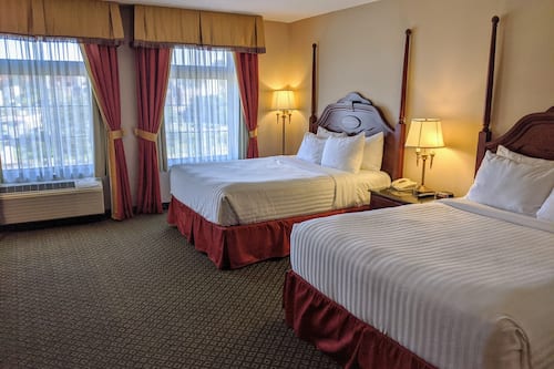 In-room safe, desk, iron/ironing board, free cribs/infant beds