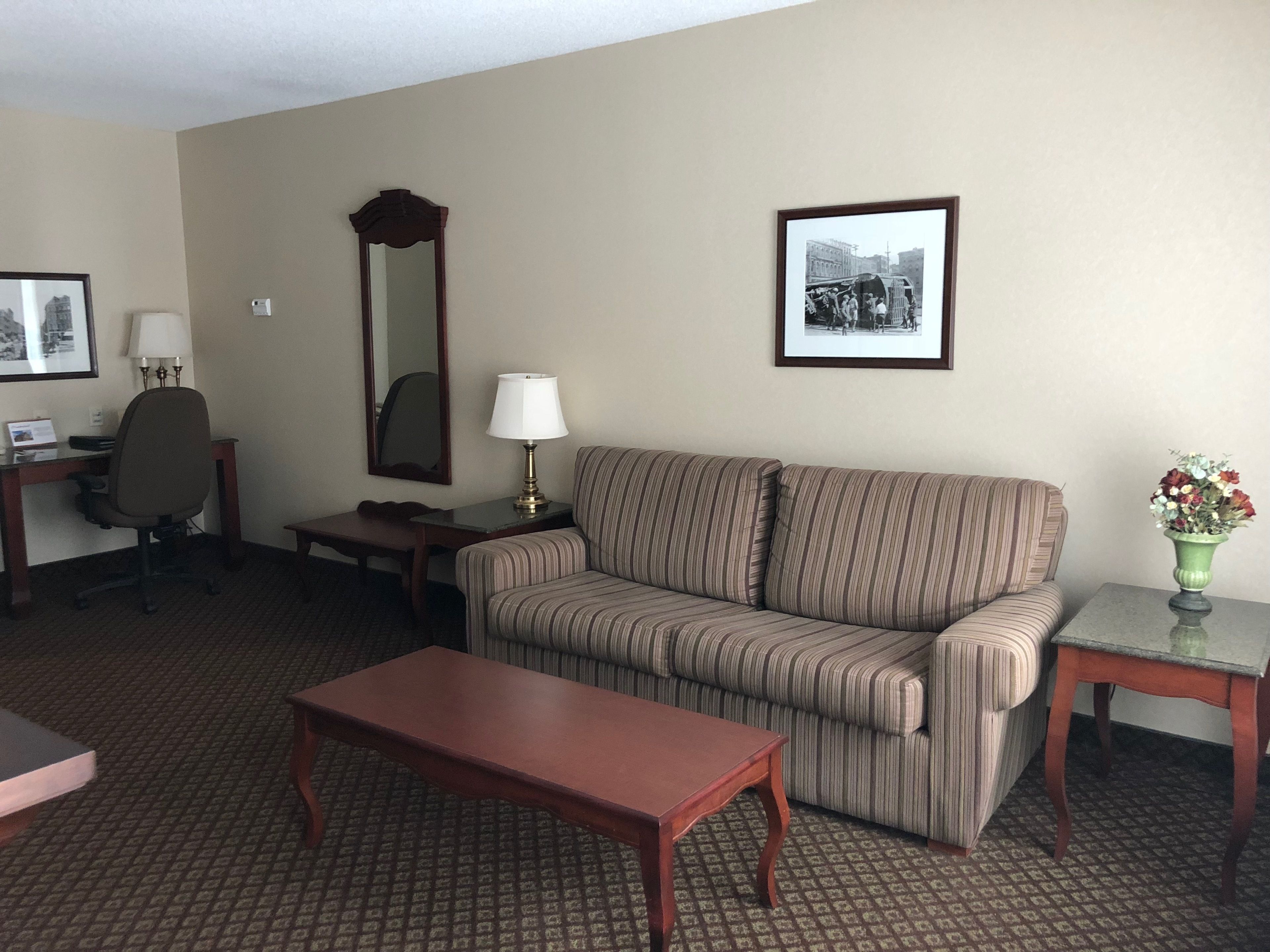 suite, 1 queen bed, non smoking | in-room safe, desk, iron/ironing board, free cots/infant beds