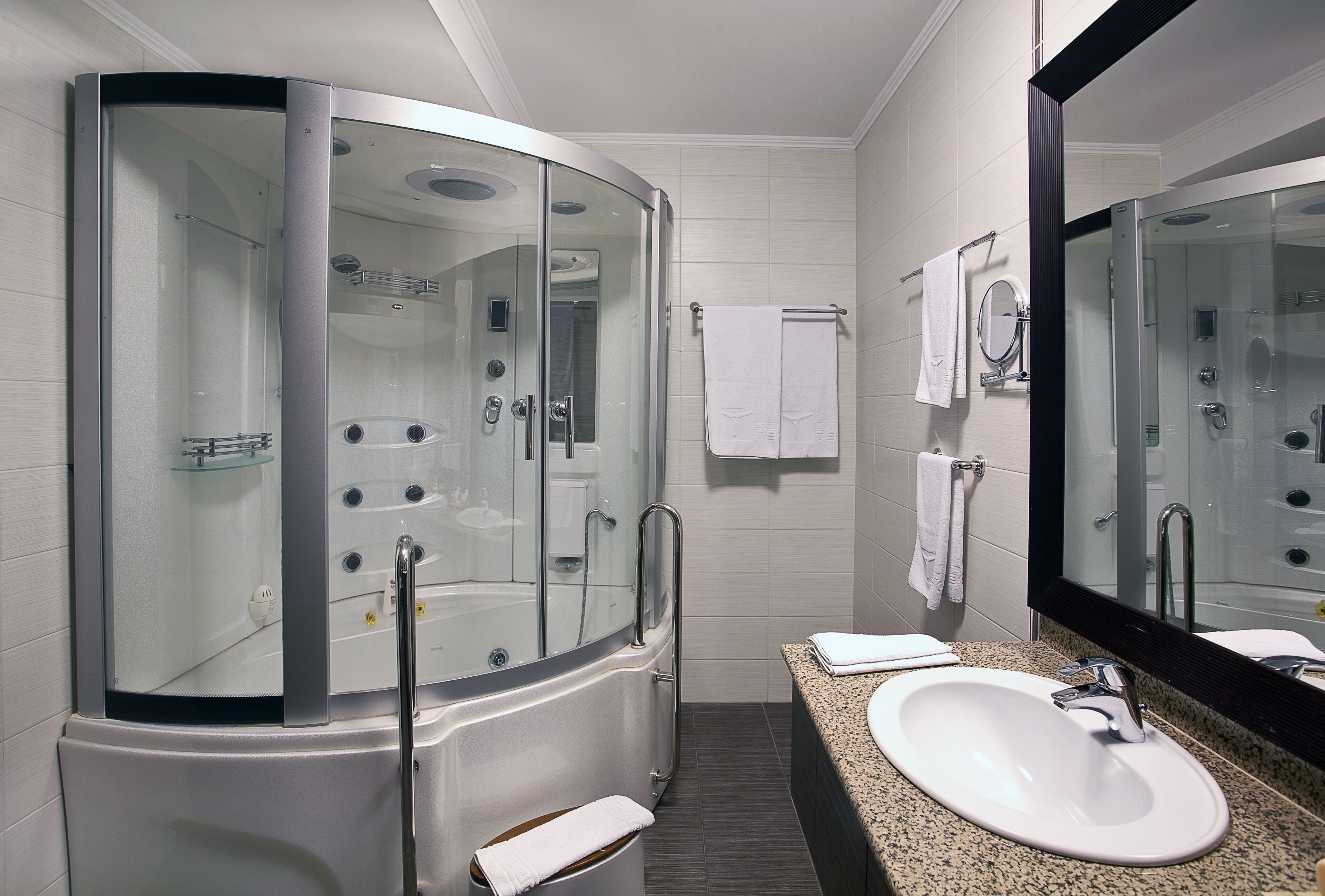 suite | bathroom | hair dryer, bathrobes, slippers, towels